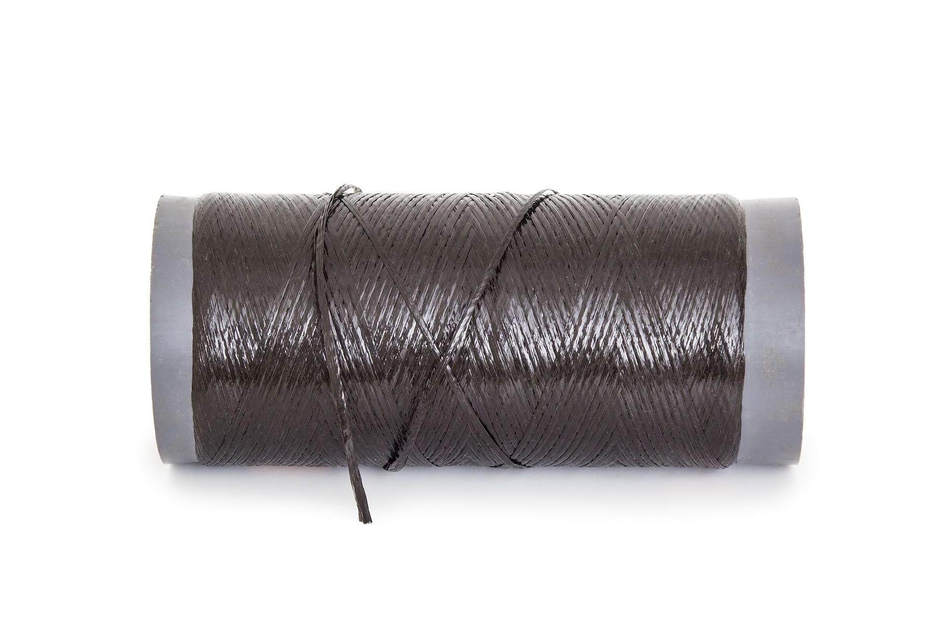 A large skein of thread on a white background